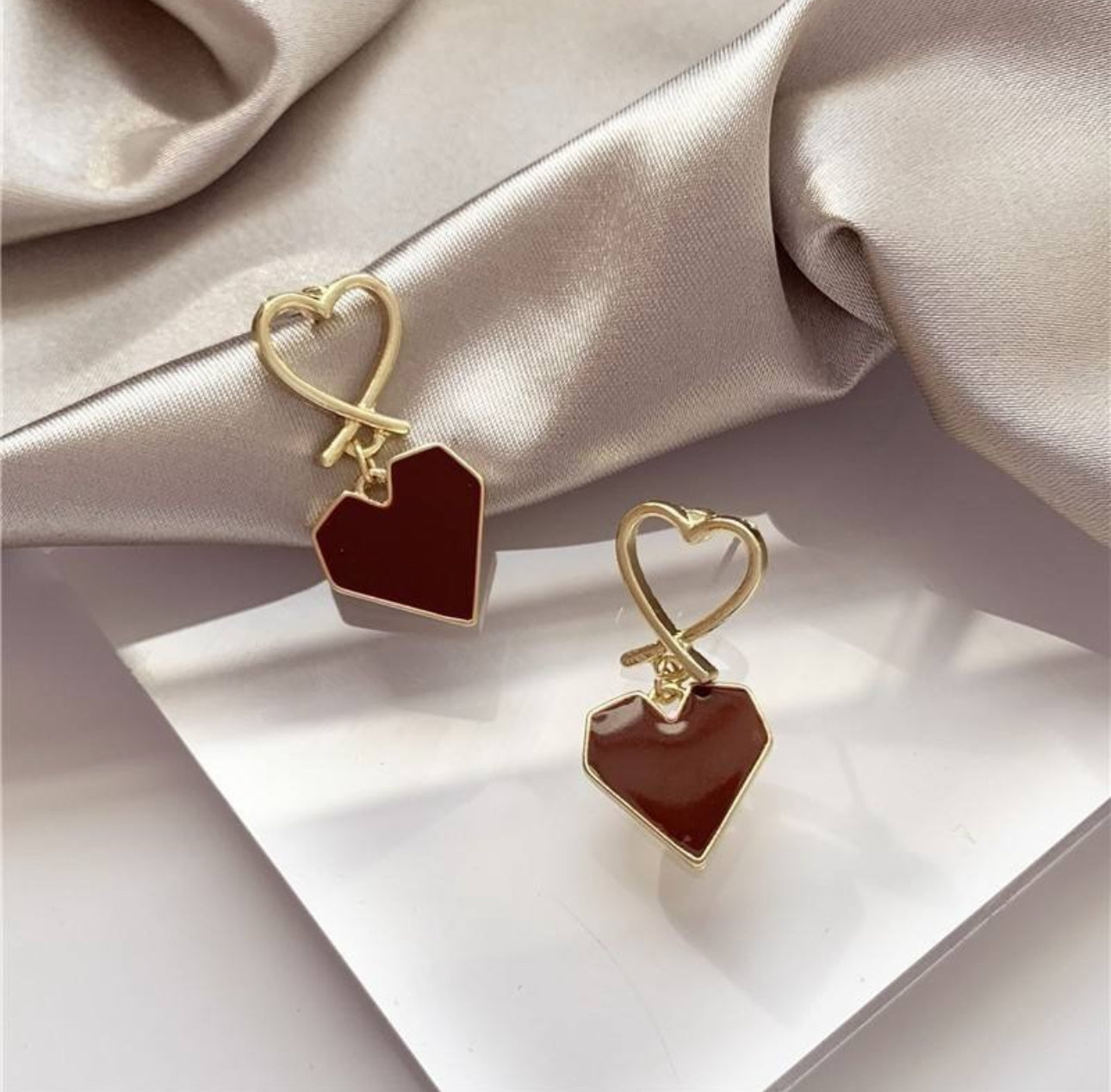 geometric heart-shaped drop earrings