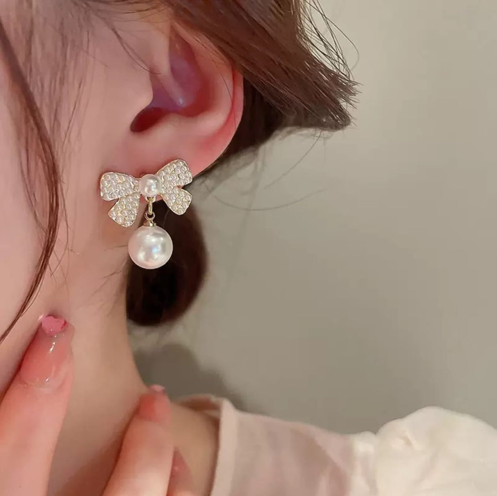 Bow-shaped drop earrings