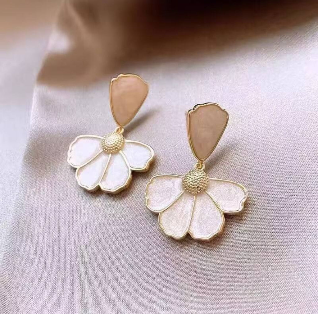 White floral-inspired drop earrings