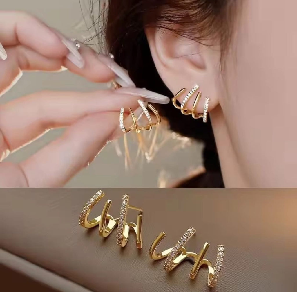 Multi-layered claw hoop earrings