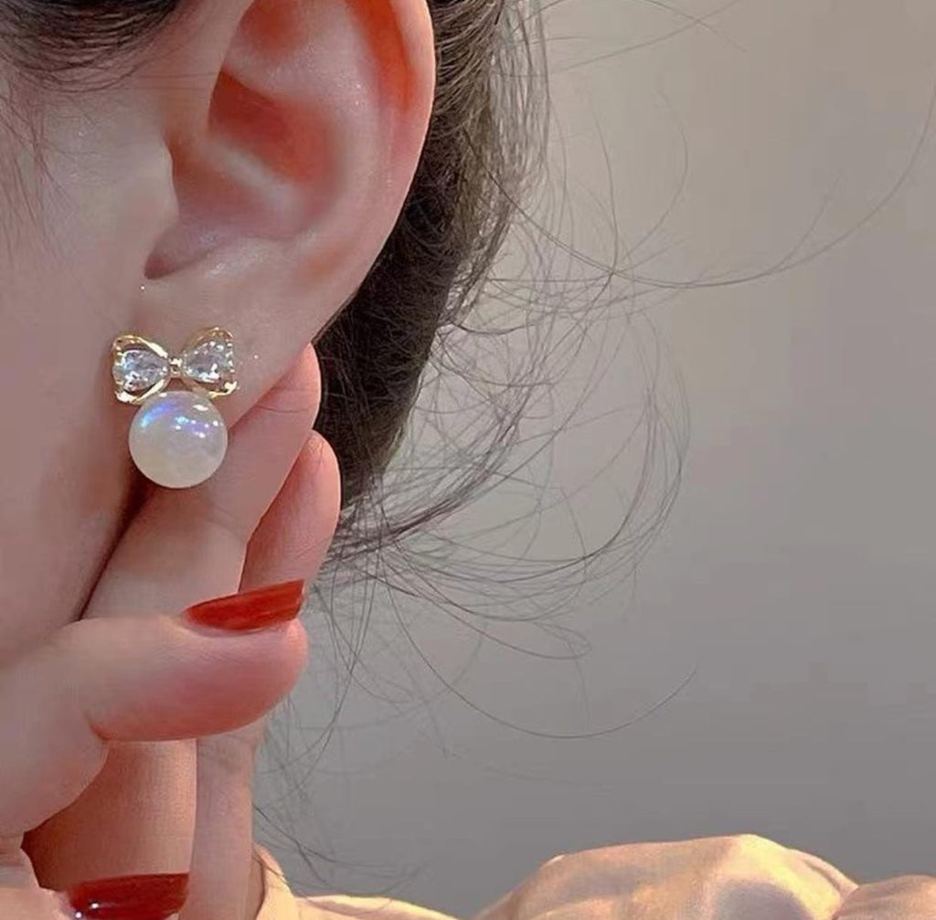 Iridescent Pearl Bow Stud Earrings