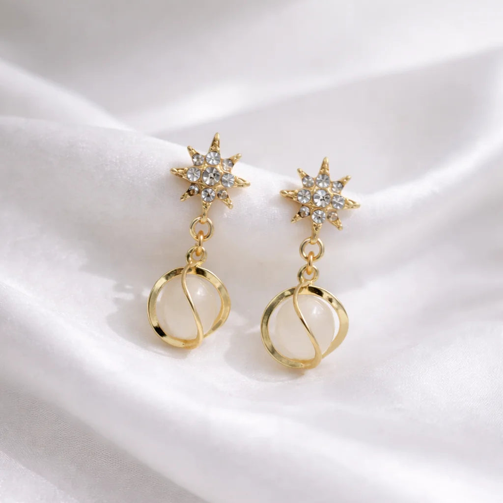 Celeste Starburst Twist Drop Earrings