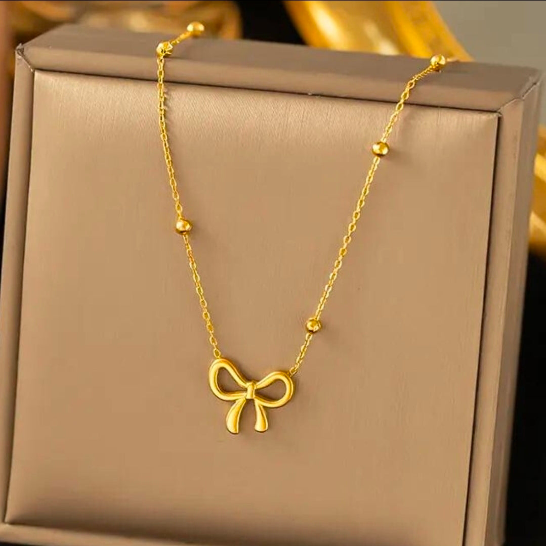 Golden Bow Bead Necklace